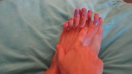 Lotion Feet - Watch marisa as she rubs lotion on her beautiful feet and soles.  Her feet are tired from walking around barefoot all day and she gets the soles super soft and her toes super pretty.